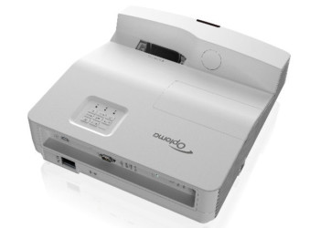 Front view of the Optoma EH330UST ultra short throw 1080p projector with its lens and white chassis